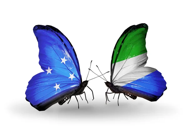 Butterflies with Micronesia and Sierra Leone flags — Stock Photo, Image