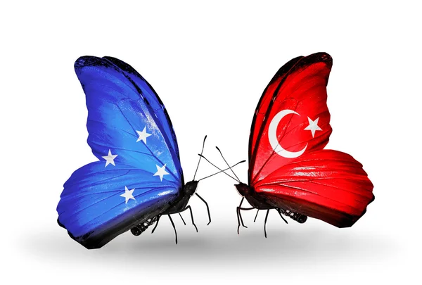 Butterflies with Micronesia and Turkey flags — Stock Photo, Image