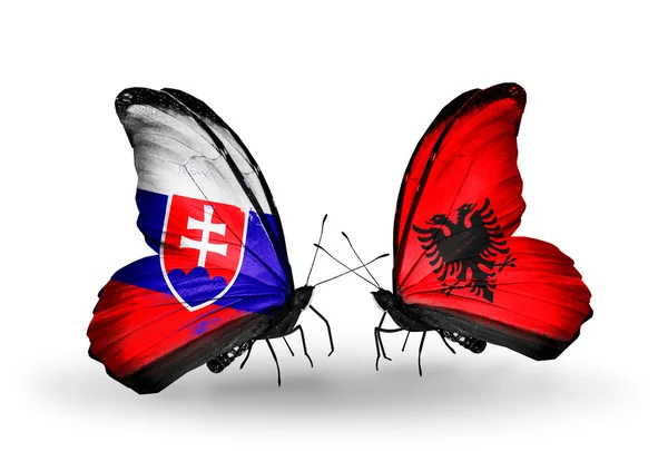 Butterflies with Slovakia and Albania flags — Stock Photo, Image