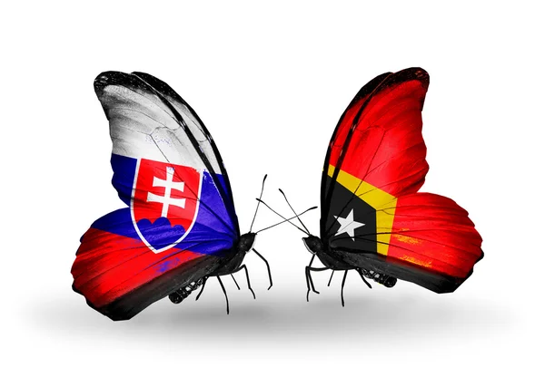 Mariposas con banderas de Eslovaquia y Timor Oriental — Foto de Stock