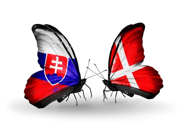 Butterflies with Slovakia and Denmark flags — Stock Photo, Image