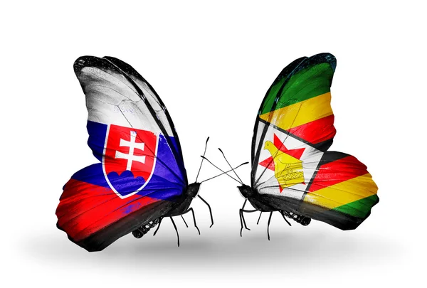 Kelebekler Slovakya ve Zimbabve bayrağı ile — Stok fotoğraf