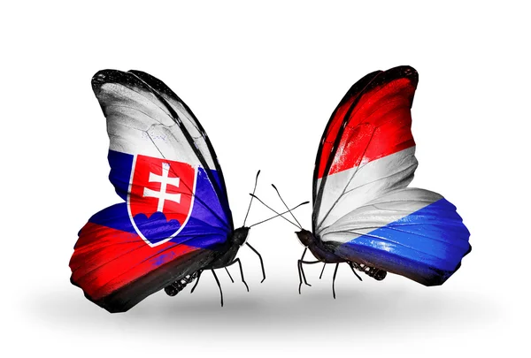 Borboletas com bandeiras da Eslováquia e do Luxemburgo — Fotografia de Stock