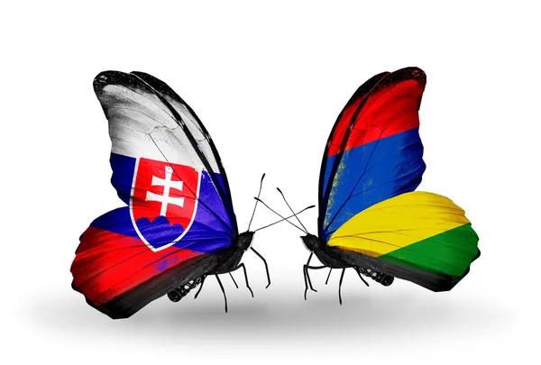 Butterflies with Slovakia and Mauritius flags — Stock Photo, Image