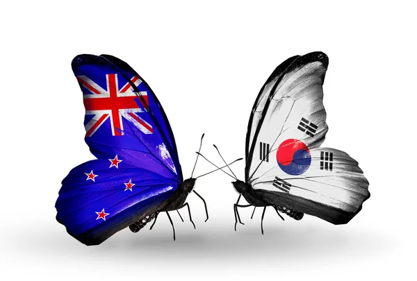 Papillons avec des drapeaux de Nouvelle-Zélande et de Corée du Sud — Photo