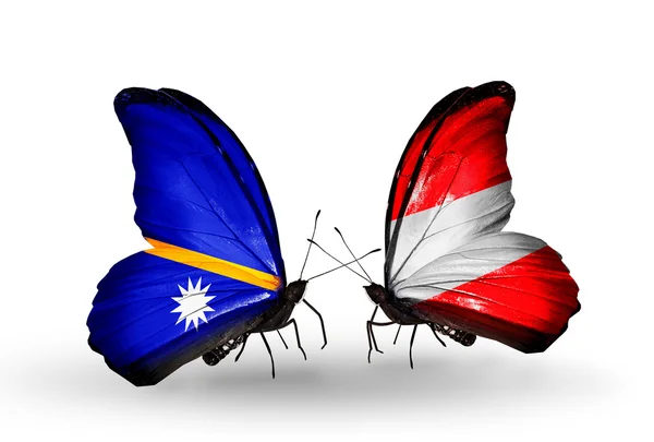 Butterflies with Nauru and Austria flags — Stock Photo, Image