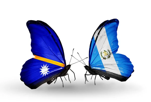 Motýli s příznaky Nauru a Guatemala — Stock fotografie