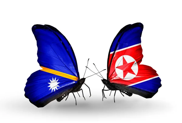 Vlinders met Nauru en Noord-Korea vlaggen — Stockfoto