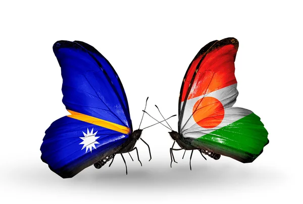 Бабочки с флагами Науру и Нигера — стоковое фото