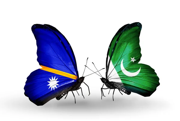 Butterflies with  Nauru and Pakistan flags — Stock Photo, Image