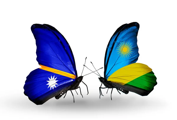 Butterflies with Nauru and Rwanda flags — Stock Photo, Image