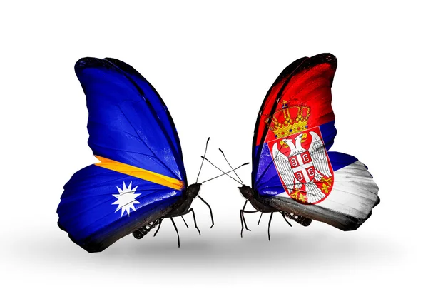 Butterflies with Nauru and Serbia flags — Stock Photo, Image