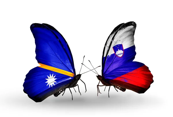 Butterflies with Nauru and Slovenia flags — Stock Photo, Image