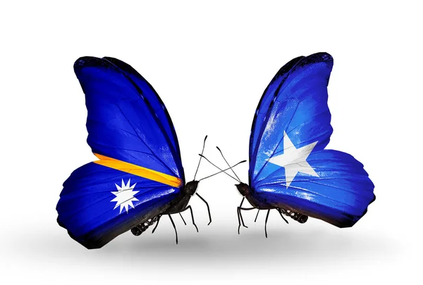 Butterflies with Nauru and Somalia flags — Stock Photo, Image