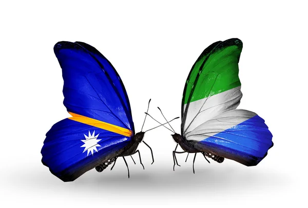 Butterflies with Nauru and Sierra Leone flags — Stock Photo, Image