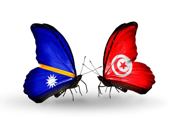 Butterflies with Nauru and Tunisia flags — Stock Photo, Image