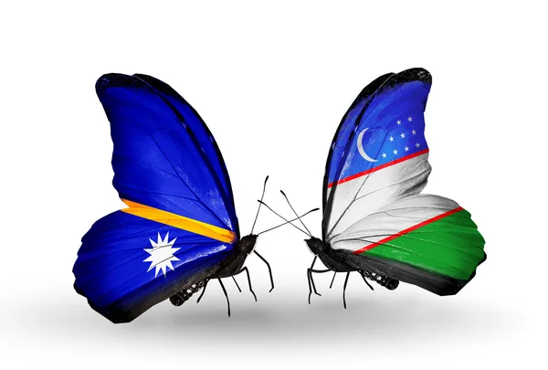 Farfalle con bandiere Nauru e Uzbekistan — Foto Stock
