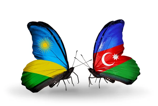 Butterflies with Rwanda and Azerbaijan flags — Stock Photo, Image