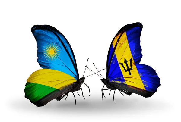 Butterflies with Rwanda and Barbados flags — Stock Photo, Image