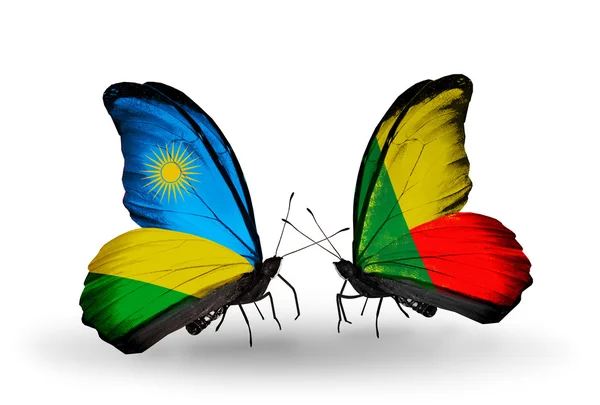 Butterflies with Rwanda and Benin flags — Stock Photo, Image