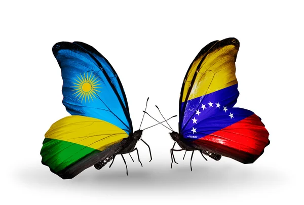 Kelebekler Ruanda ve Venezuela bayraklı — Stok fotoğraf