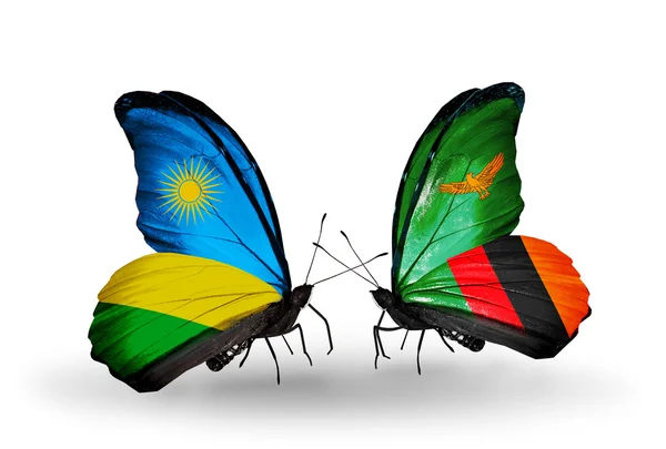 Borboletas com bandeiras de Ruanda e Zâmbia — Fotografia de Stock