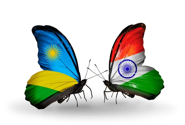 Butterflies with Rwanda and  India flags — Stock Photo, Image