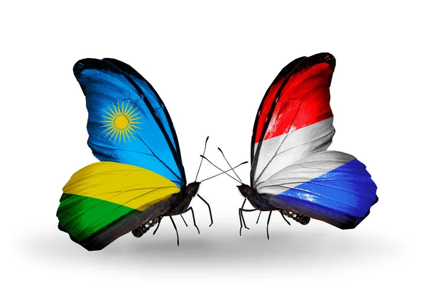 Papillons avec drapeaux Rwanda et Luxembourg — Photo