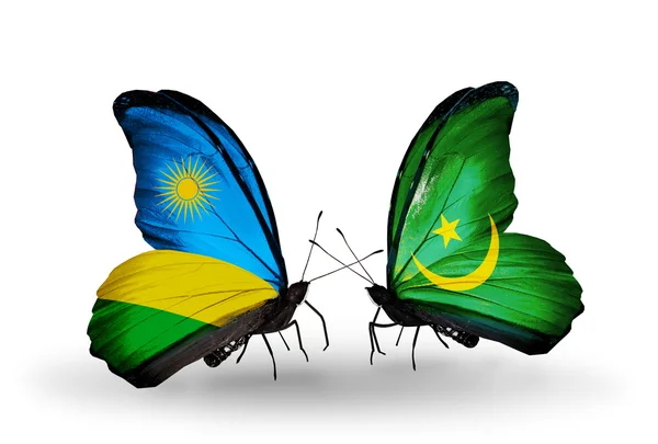 Fjärilar med Rwanda och Mauretanien flaggor — Stockfoto