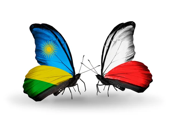 Papillons avec drapeaux Rwanda et Pologne — Photo