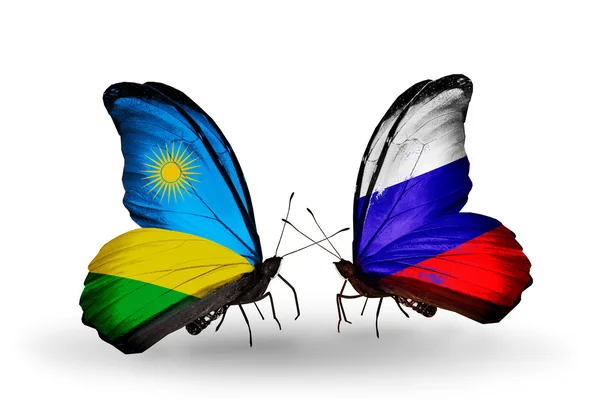 Papillons avec drapeaux Rwanda et Russie — Photo