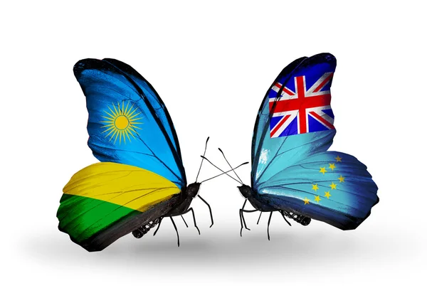 Fjärilar med Rwanda och Tuvalu flaggor — Stockfoto