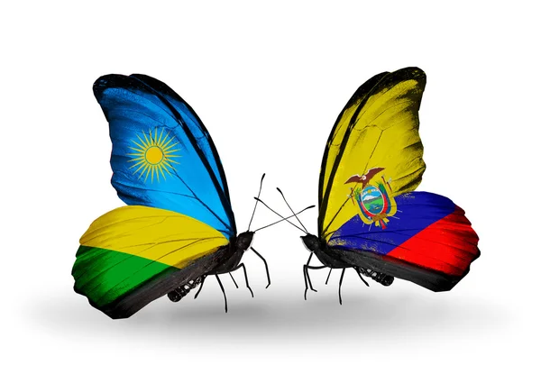 Vlinders met Rwanda en Ecuador vlaggen — Stockfoto