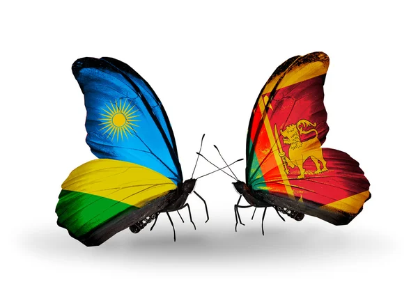 Butterflies with Rwanda and Sri Lanka flags — Stock Photo, Image