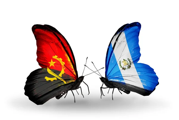 Borboletas com bandeiras de Angola e Guatemala — Fotografia de Stock