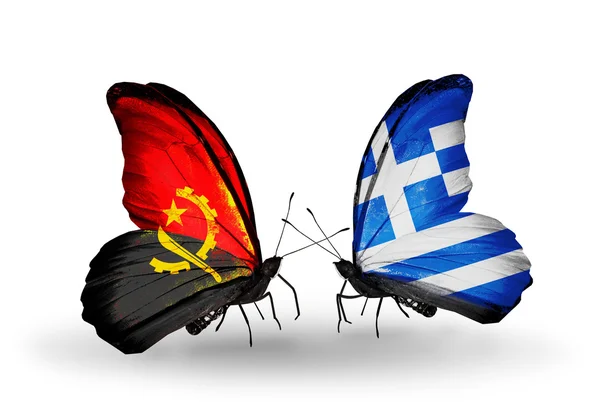 Бабочки с флагами Анголы и Греции — стоковое фото