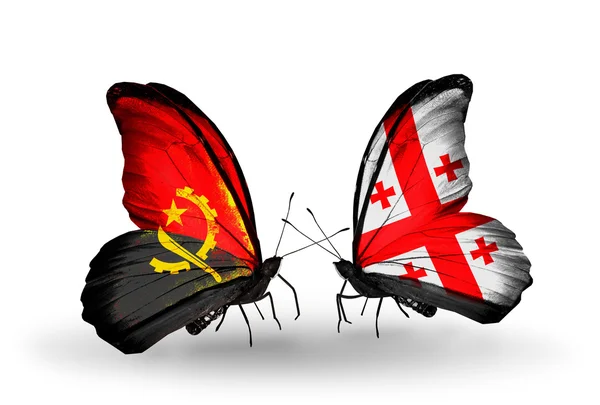 Butterflies with Angola and Georgia flags — Stock Photo, Image