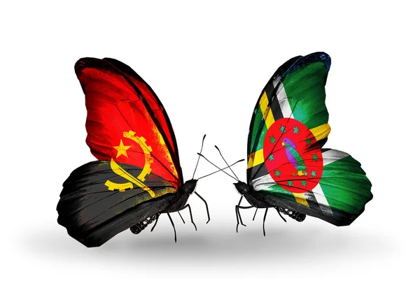 Papillons avec drapeaux Angola et Dominique — Photo