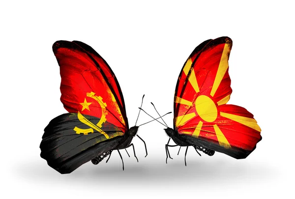 蝴蝶与安哥拉和马其顿国旗 — 图库照片