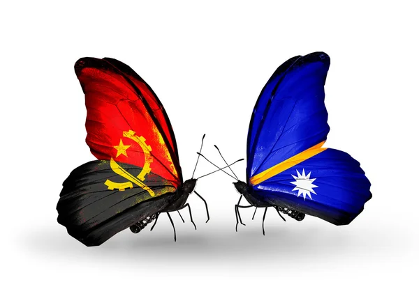 Butterflies with Angola and Nauru flags — Stock Photo, Image