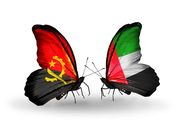 Butterflies with Angola and UAE flags — Stock Photo, Image