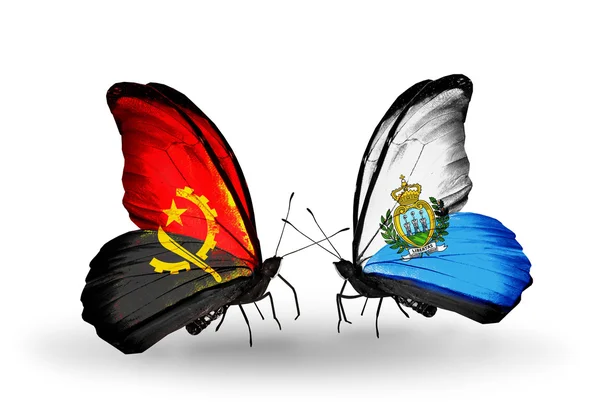 Mariposas con banderas de Angola y San Marino —  Fotos de Stock