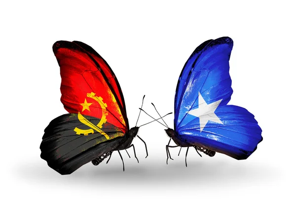 Butterflies with  Angola and Somalia flags — Stock Photo, Image