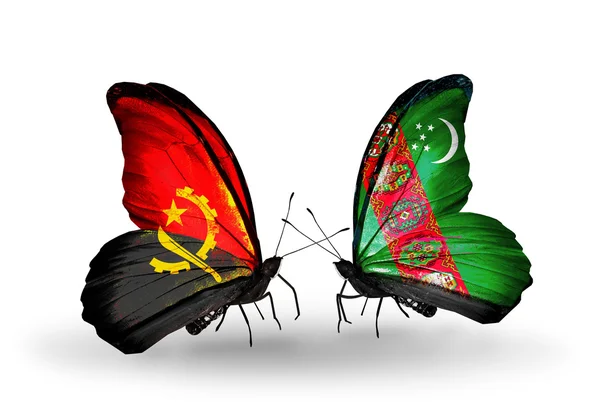 Butterflies with Angola and  Turkmenistan flags — Stock Photo, Image