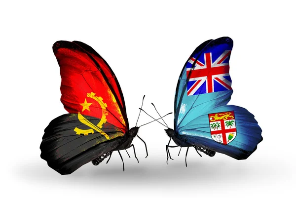 Бабочки с флагами Анголы и Фиджи — стоковое фото