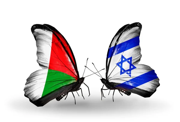 Butterflies with Madagascar and Israel flags — Stock Photo, Image