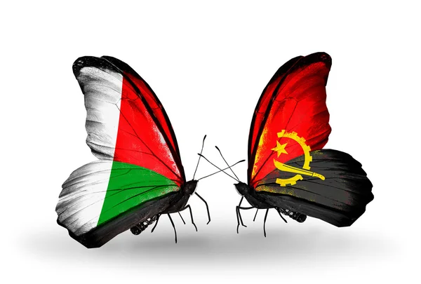 Mariposas con banderas de Madagascar y Angola —  Fotos de Stock