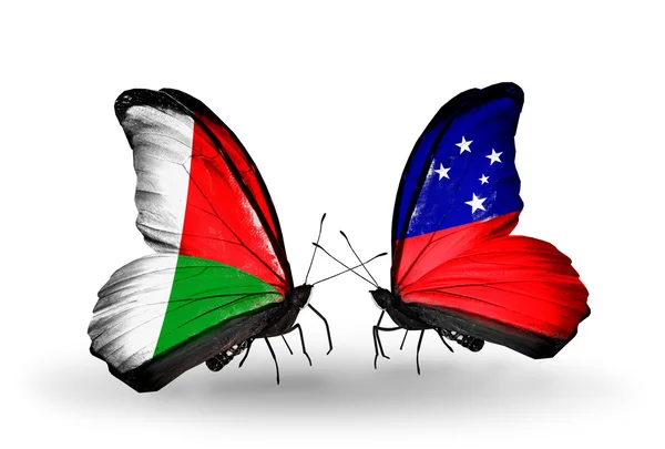 Butterflies with Madagascar and Samoa flags — Stock Photo, Image