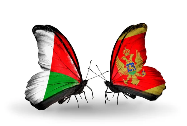 Mariposas con banderas de Madagascar y Montenegro — Foto de Stock