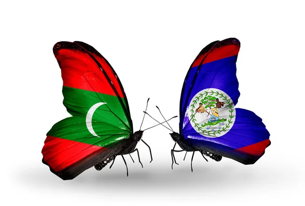 Borboletas com bandeiras de Maldivas e Belize — Fotografia de Stock